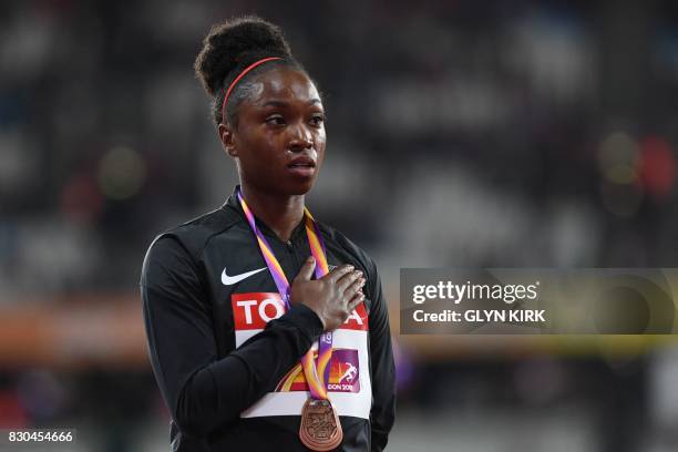 Bronze medallist US athlete Tianna Bartoletta poses on the podium during the victory ceremony for the women's long jump athletics event at the 2017...