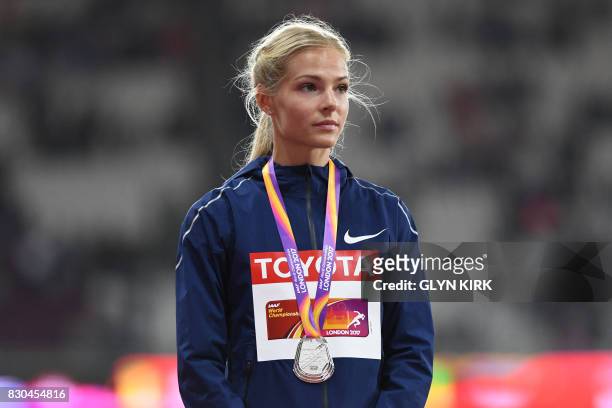 Silver medallist Authorised Neutral Athlete Darya Klishina poses on the podium during the victory ceremony for the women's long jump athletics event...