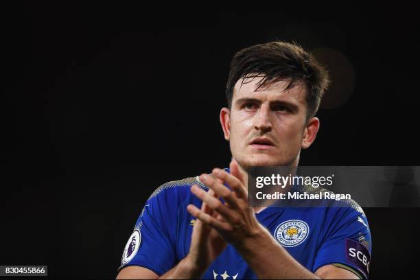 Dejected Harry Maguire of Leicester City applauds the travelling fans following their team's 4-3 defeat during the Premier League match between...