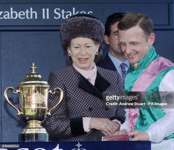 Kevin Darley, who rode to victory in the Queen Elizabeth II Stakes at Royal Ascot, accepting the winner's medal from Princess Margaret. His ride,...