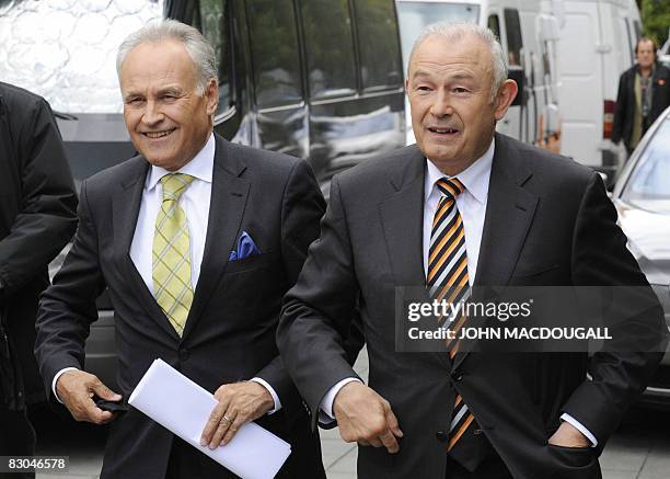 Bavarian Premier and CSU main candidate Guenther Beckstein and CSU Chairman Erwin Huber arrive for a press conference after a meeting of the party...