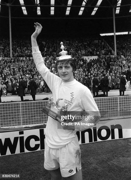 Leeds United player Allan Clarke, who scored the only goal of the 1972 FA Cup Final, wears the FA Trophy lid on his head and holds the 'man of the...