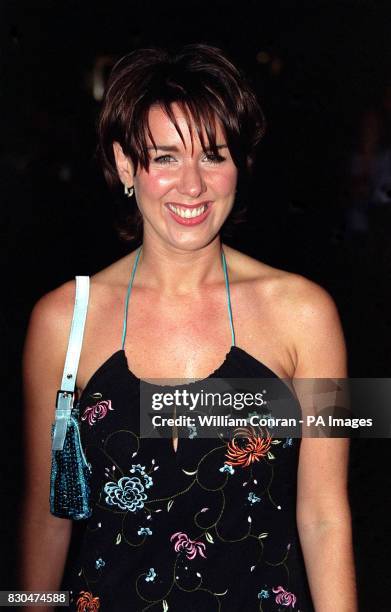 Actress Claire Sweeney from the Channel 4 soap Brookside, arrives at the National Television Awards 2000 at the Royal Albert Hall in London....