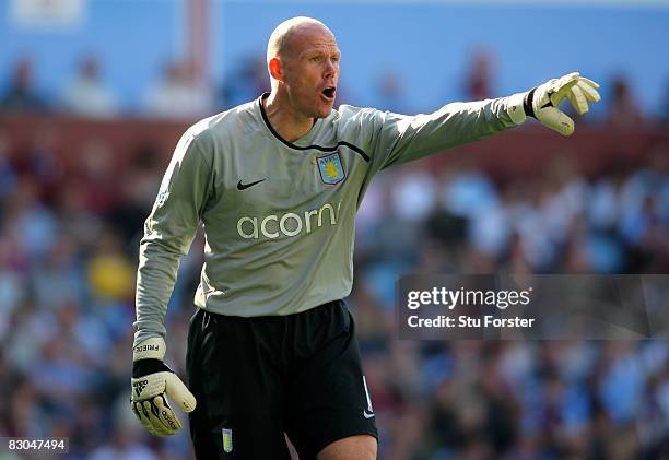 Aston Villa goalkeeper Brad Friedel makes a point during the Barclays Premier League match between Aston Villa and Sunderland at Villa Park on...