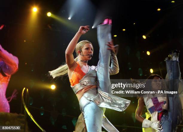 Teenage American pop singer Britney Spears performing on stage during her UK concert, at Wembley Arena, in London.