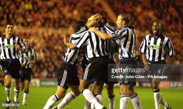 Team mates congratulate Newcastle United's Alain Goma after he scored their second goal against Middlesbrough during their FA Premiership football...