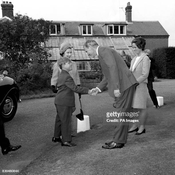 Eight year old Prince Andrew, the future Duke of York, and his mother Queen Elizabeth II , are greeted on arrival at Heatherdown Preparatory School,...