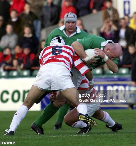 Ireland captian Keith Wood breaks through the Japanese defence during their International friendly match at Lansdowne Road, Dublin.