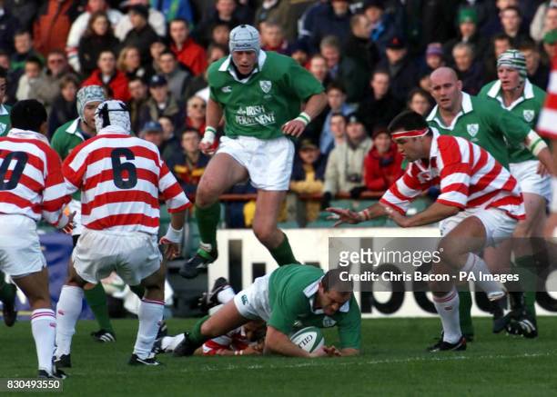 Ireland's prop Peter Clohessy is brought down by the Japanese defence on the goal line during the International friendly at Lansdowne Road, Dublin.
