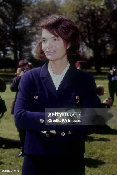 Jacqueline Kennedy, the wife of the late American President John F. Kennedy, poses for photographers in St. James's Park, London.