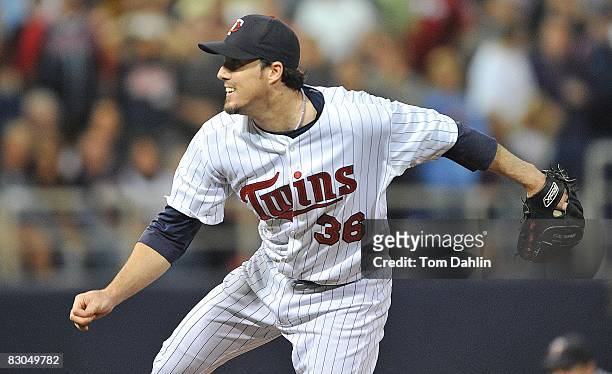 Joe Nathan of the Minnesota Twins delivers a pitch during an MLB game against the Chicago White Sox at the Hubert H. Humphrey Metrodome, September...