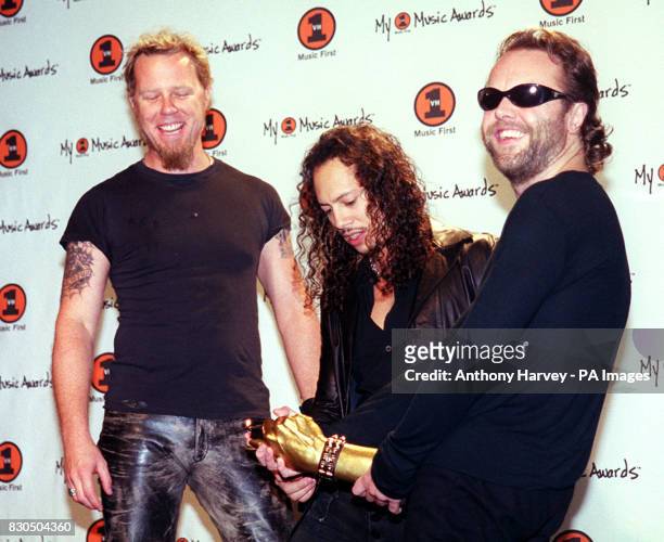 Rock band Metallica L-R: James Hetfield, Kirk Hammett and Lars Ulrich with their Best Stage Spectacle Award at the My VH1 Awards 2000, at the Shrine...