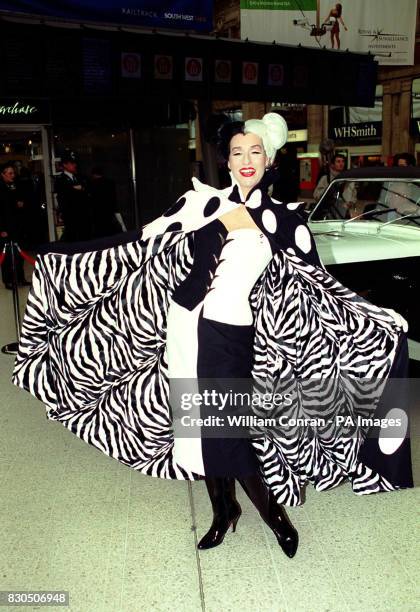 Cruella DeVil at Waterloo Station in London to launch Disney's 102 Dalmations Eurostar train. All 18 coaches of the train are covered with images of...