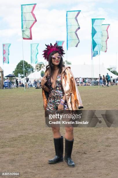 Digital Influencer Bonnie Rakhit TheStyleTraveller.com wears Pretty Little Thing sunglasses, Headress, jacket and Playsuit, Sorel boots on day 3 of...