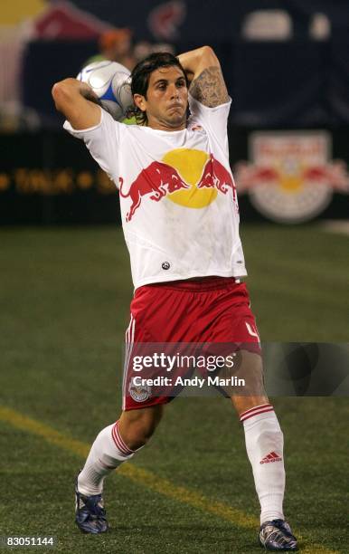 Carlos Mendes of the New York Red Bulls throws the ball into play against the Colorado Rapids during their game at Giants Stadium on September 27,...