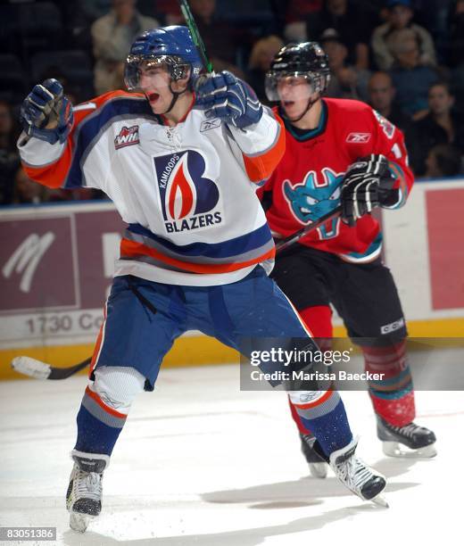 Jimmy Bubnick of the Kamloops Blazers and Dylan Hood of the Kelowna Rockets watch a goal against the Kelowna Rockets at Prospera Place on September...