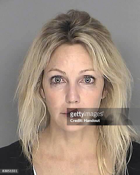 In this handout image provided by the Santa Barbara County Sheriff's Dept., actress Heather Locklear poses for a mugshot September 28, 2008 in Santa...