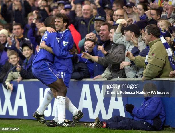 Chelsea's Jimmy Floyd Hasselbaink celebrates with Gianfranco Zola after he had scored during their FA Cup Third round match against Peterborough...