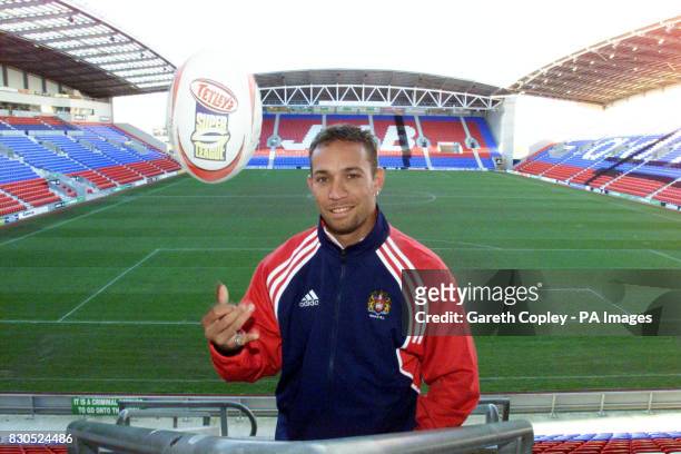Papua New Guinea captain Adrian Lam signs for Wigan Warriors Rugby League Club, at the JJB Stadium, Wigan. He has joined the club from Australia's...