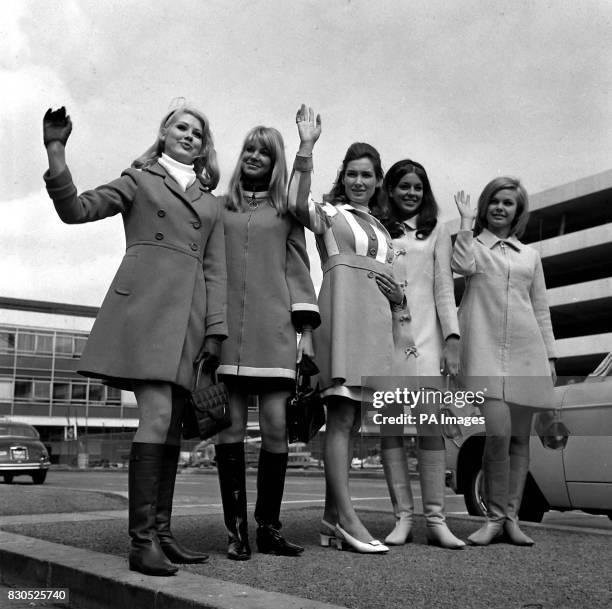 Five girls who intend to keep a date in Hollywood with star Dean Martin are shown at Heathrow Airport. They are Penny Brahms, Karin Feddersen,...