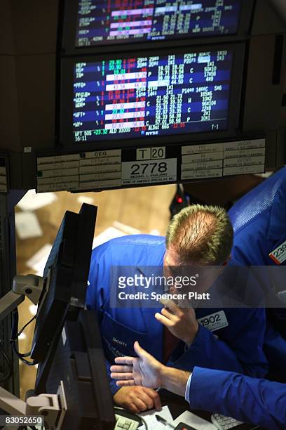 Trader works on the floor of the New York Stock Exchange September 29, 2008 in New York City. U.S. Stocks took a nosedive in reaction to the global...