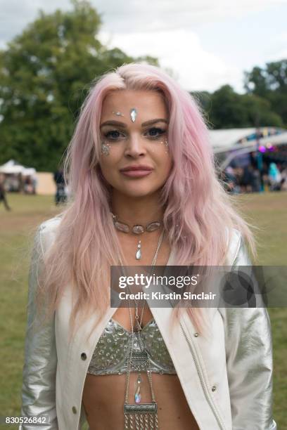 Student Eva Gregertsen wears an Ann Summers Bra top, vintage jacket on day 3 of Wilderness Festival on August 5, 2017 in Cornbury Park, Oxford,...