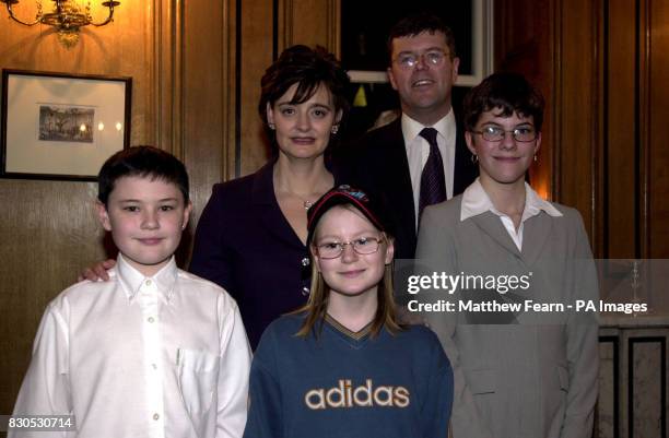 Prime Minister's wife Cherie Blair with MP for Sutton and Cheam Paul Burstow, and children Philip Amor, Heather Cole and Kayleigh Smith at a tea...