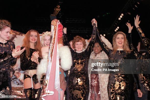 Vivienne Westwood surrounded by models after being awarded British fashion's highest award - Designer of the Year - at the Royal Albert Hall.