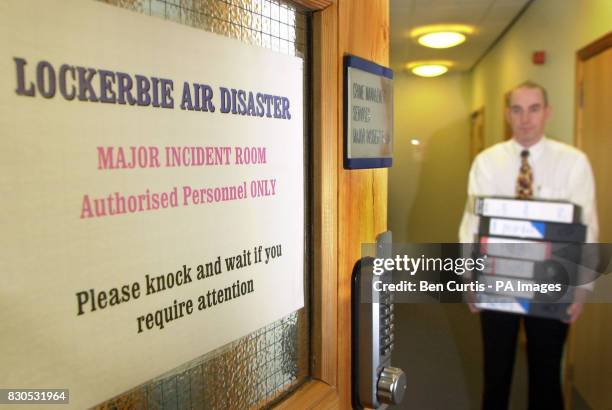 Team member carries files into the control room of the Lockerbie Planning Unit in Dumfries where all arrangements for the trial at Kamp Van Zeist,...