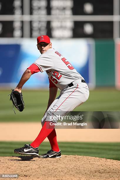 Jason Bulger of the Los Angeles Angels pitches during the game against the Oakland Athletics at the McAfee Coliseum in Oakland, California on...
