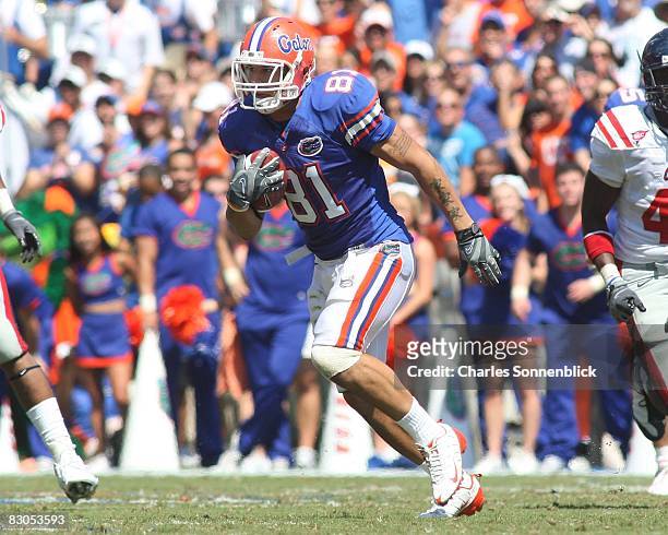 Wide receiver Aaron Hernandez of the Florida Gators catches a pass for a large gain against the Mississippi Rebels during there game at Ben Hill...