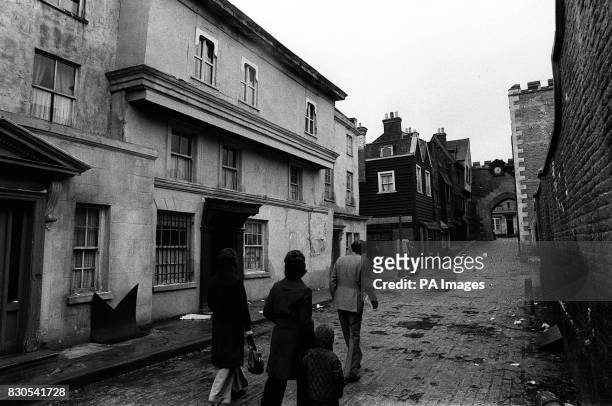 Visitors to Shepperton film studios, stroll along a mock-up of a street used in the musical film Oliver. *11/02/01 The film studio behind hits such...