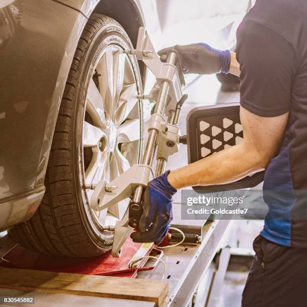 wheel alignment - cars in a row stock pictures, royalty-free photos & images