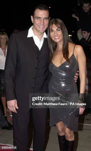 Footballer turned actor Vinnie Jones and his wife Tanya arrive at the Dorchester Hotel in London for the Empire Film Awards.