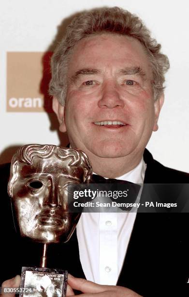 Veteran British actor Albert Finney with his Academy fellowship award during The Orange British Academy Film Awards at the Odeon in London's...