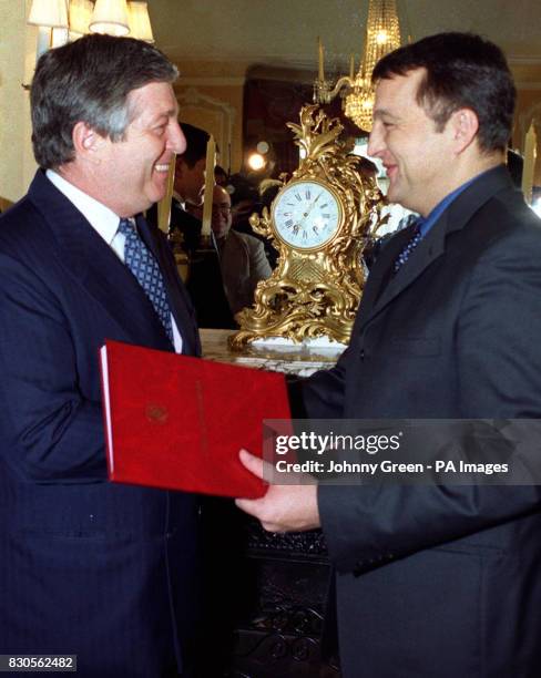 His Excellency Mr Zoran Zivkovic, Federal Minister of the Interior of Yugoslavia officially presents Certificates of Citizenship to Crown Prince...