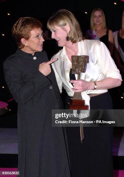 Actress Sarah Lancashire with her TRIC Award for Drama TV Performer Of The Year at the Television Radio Industry Club Awards with Anne Robinson at...