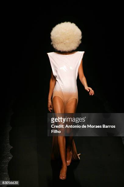Model walks the runway at the Maison Martin Margiela fashion show during Paris Fashion Week on September 29, 2008 in Paris, France.
