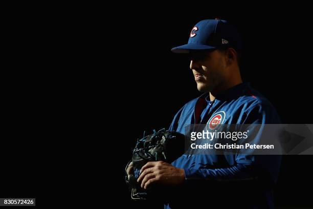 Infielder Anthony Rizzo of the Chicago Cubs warms up before the MLB game against the Arizona Diamondbacks at Chase Field on August 11, 2017 in...