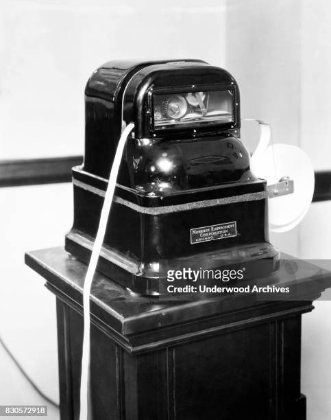 The new stock exchange ticker tape machine manufactured by the Morkrum Kleinschmidt Corporation, Chicago, Illinois, April 1926.