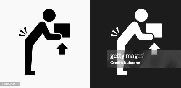 lifting hazard icon on black and white vector backgrounds - lifting box white background stock illustrations
