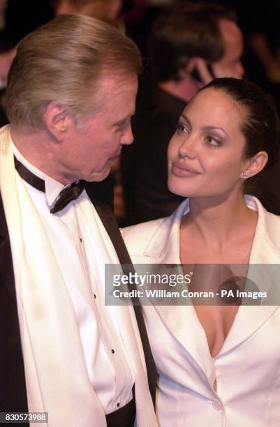 Actor Jon Voight and daughter actress Angelina Jolie at the Vanity Fair Post Oscars Party, held at Morton's in Los Angeles, USA. She is wearing a...
