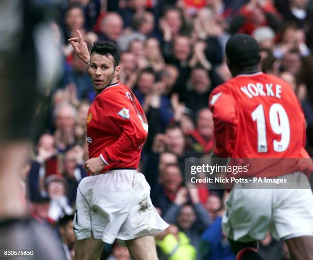 Manchester United's Ryan Giggs celebrates his goal with team mate Dwight Yorke during the FA Carling Premiership game against Coventry City at Old...