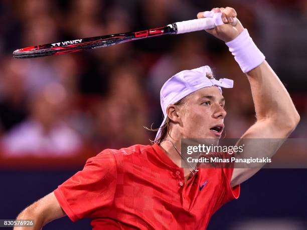 Denis Shapovalov of Canada hits a return against Adrian Mannarino of France during day eight of the Rogers Cup presented by National Bank at Uniprix...