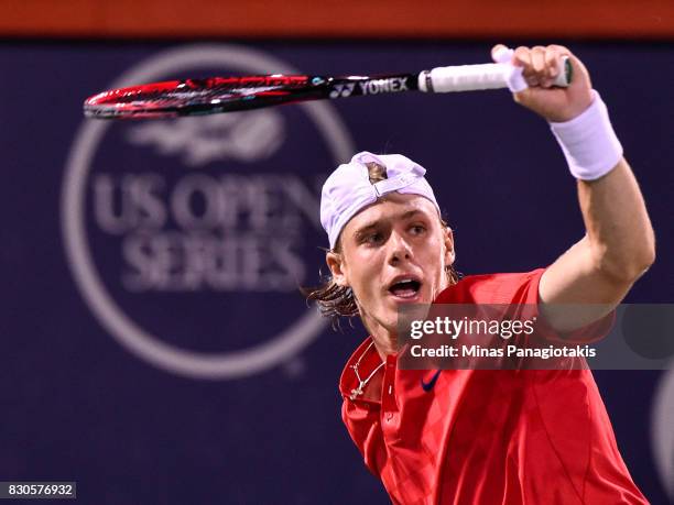 Denis Shapovalov of Canada hits a return against Adrian Mannarino of France during day eight of the Rogers Cup presented by National Bank at Uniprix...