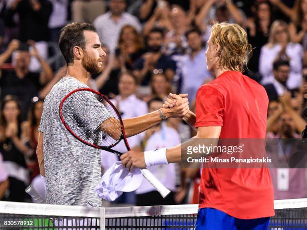 Adrian Mannarino of France congratulates Denis Shapovalov of Canada on his 2-6, 6-3, 6-4 victory during day eight of the Rogers Cup presented by...
