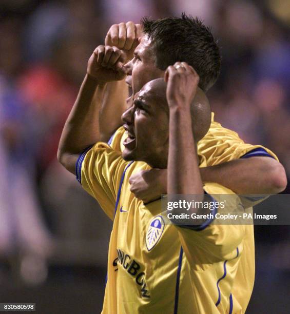 Leeds United's Olivier Dacourt and Eirik Bakke celebrate the team reaching the Semi Finals after beating Deportivo La Coruna over two legs in the...