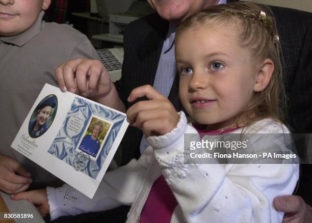 Gibraltarian Krisanne Riddell, aged 4, holds the first First Day Cover 'cancelled' of the record breaking stamp to celebrate the 75th birthday of...