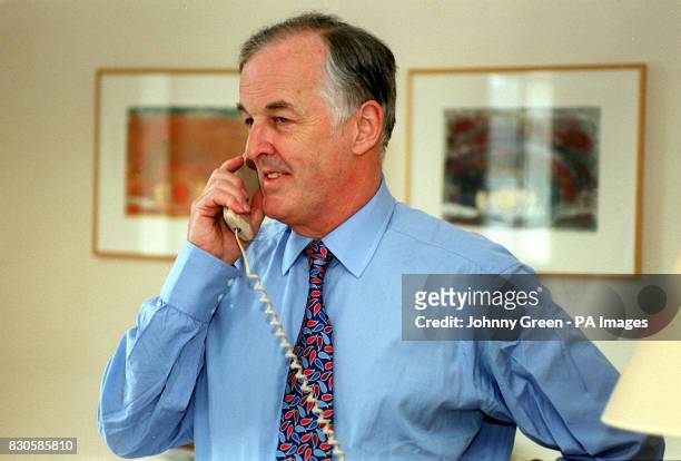 Newly-appointed chairman of BT , Sir Christopher Bland, speaks on the phone at BBC broadcasting House, London. Sir Christopher, currently Chairman of...