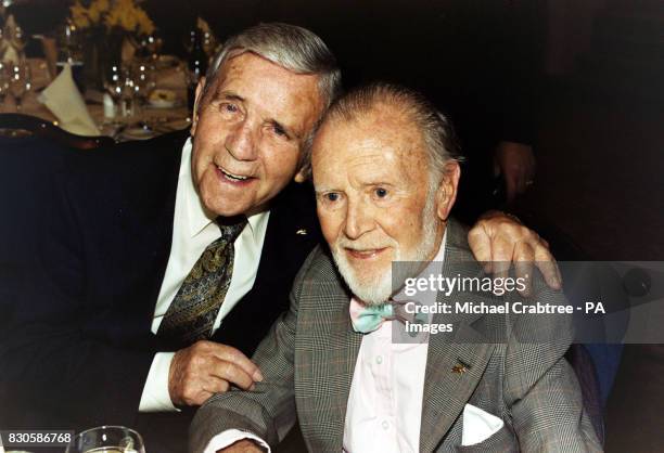 Sir Norman Wisdom and Sir John Mills at a reception dinner at Grosvenor House, London, following the unveiling of a blue plaque in honour of sixties...